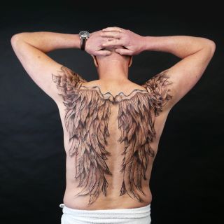 Body schmink studio wings rug shoulder logo