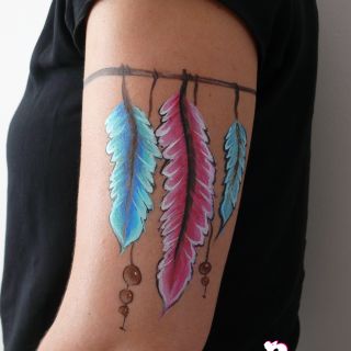 Body schmink studio arm painting feathers